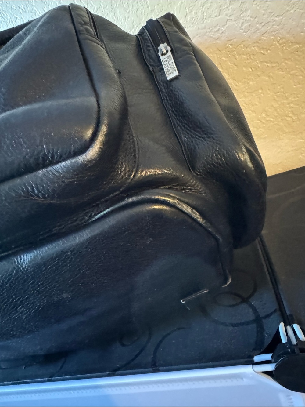 Wilsons Leather Black Pebbled Leather Drawstring Backpack - Picture 2 of 4